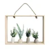 Cadre vases fleurs artificielles