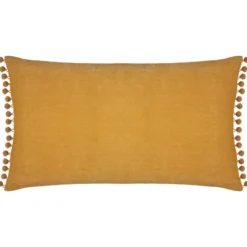 Coussin pompons 30x50