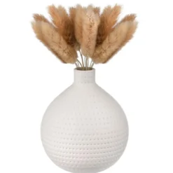 Queues de lapin dans vase boule